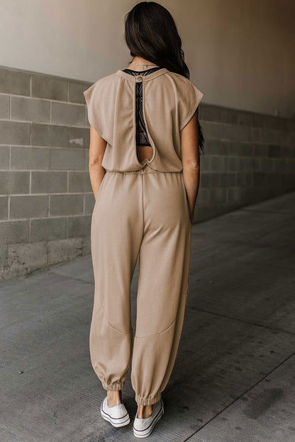 Light Beige Cap Sleeve Backless Drawstring Jogger Jumpsuit - Vesteeto