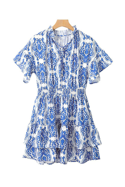 Ashleigh Blue Abstract Print Smocked Waist Tiered Mini Dress - Vesteeto