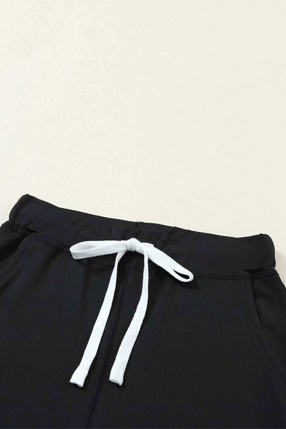 Black Casual Drawstring Drop Waist Pocketed Joggers - Vesteeto