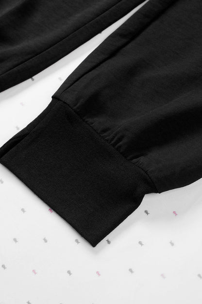 Black Casual Pocketed Tapered Elastic Waist Joggers - Vesteeto