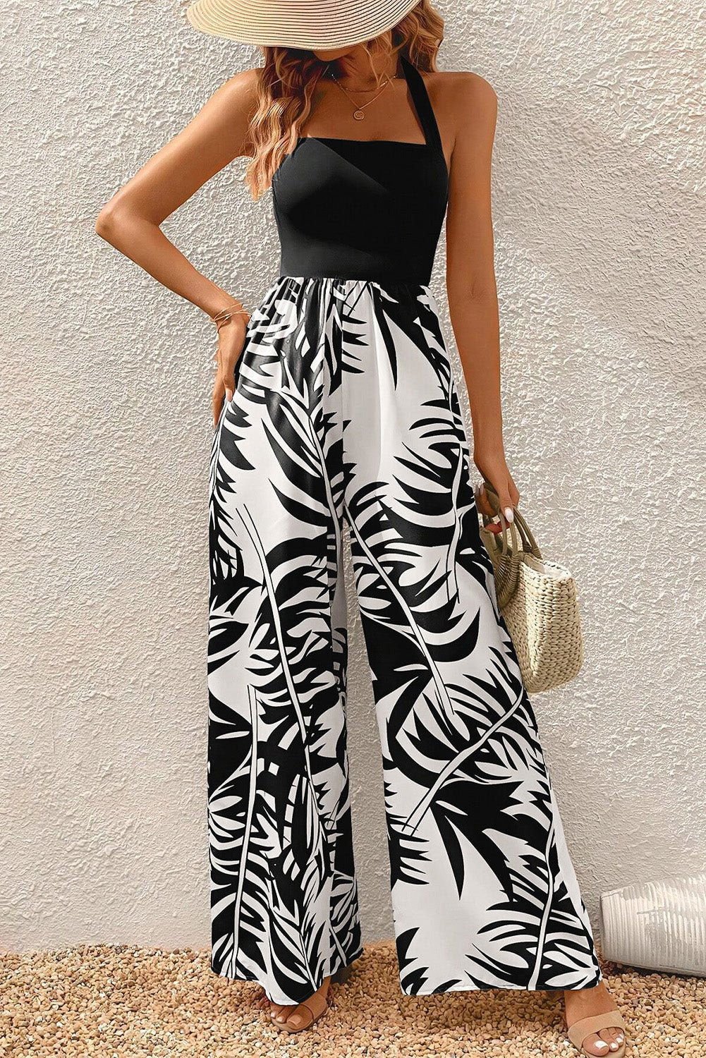 Black Halter Tropical Print Wide Leg Jumpsuit - Vesteeto