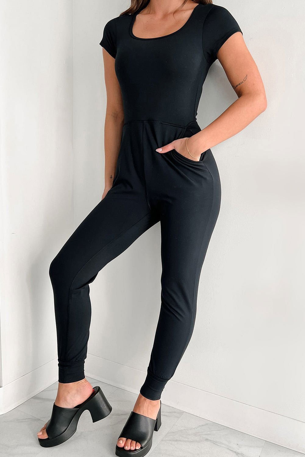 Black Short Sleeve Pocketed Athleisure Jogger Jumpsuit - Vesteeto