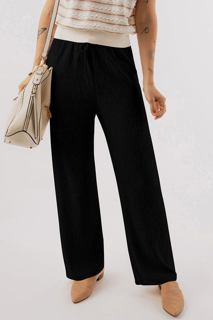 Black Solid Color Textured Loose Drawstring Pants - Vesteeto