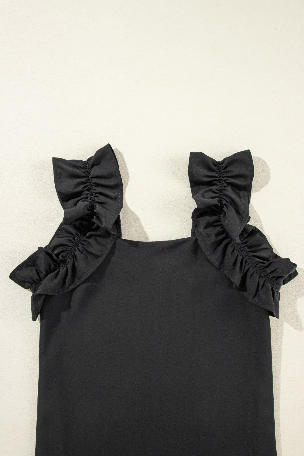 Black Solid Ruffle Trim Sleeveless Blouse - Vesteeto